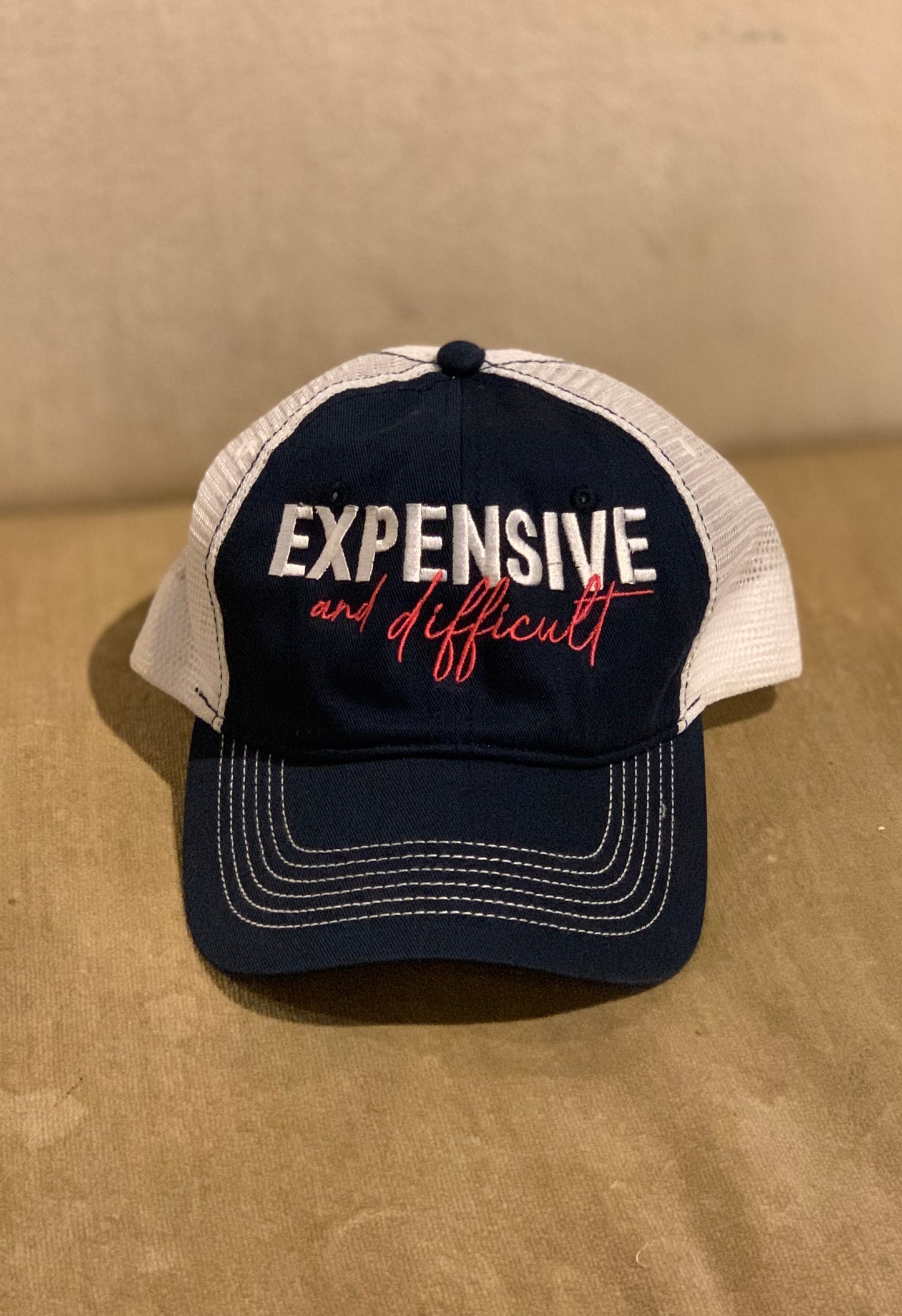 Expensive and Difficult Trucker Hat