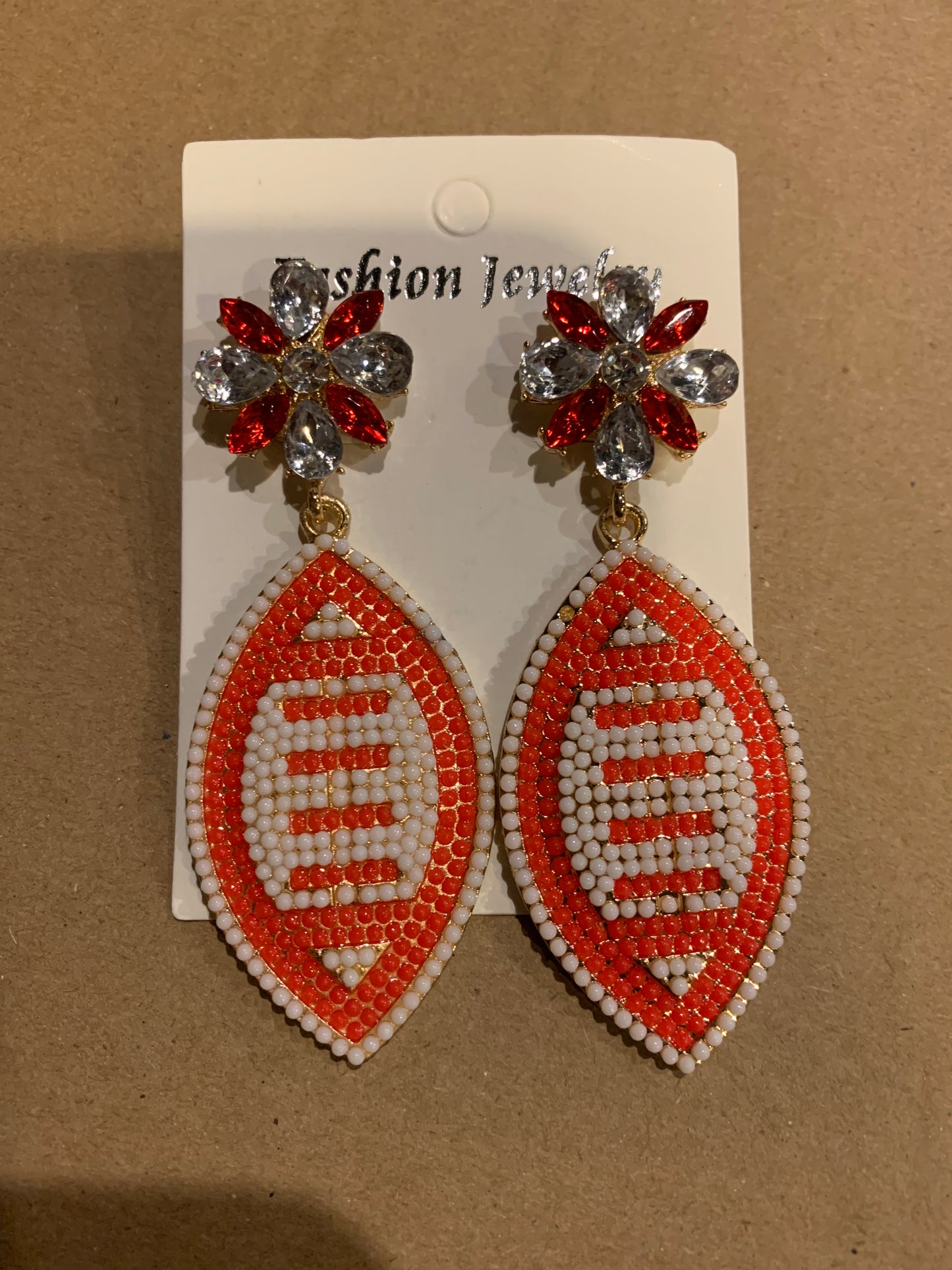 Beaded football earrings