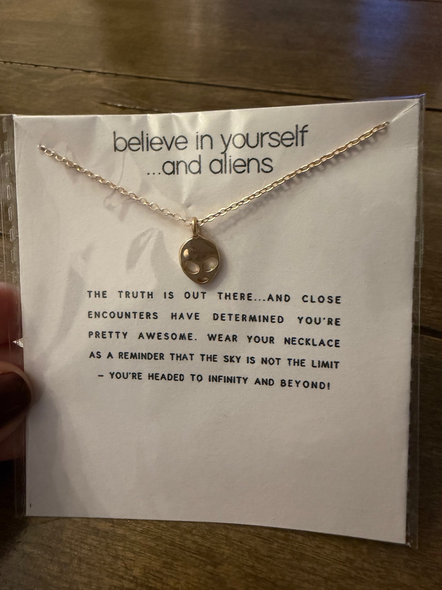 . Believe in yourself…..and aliens card necklace