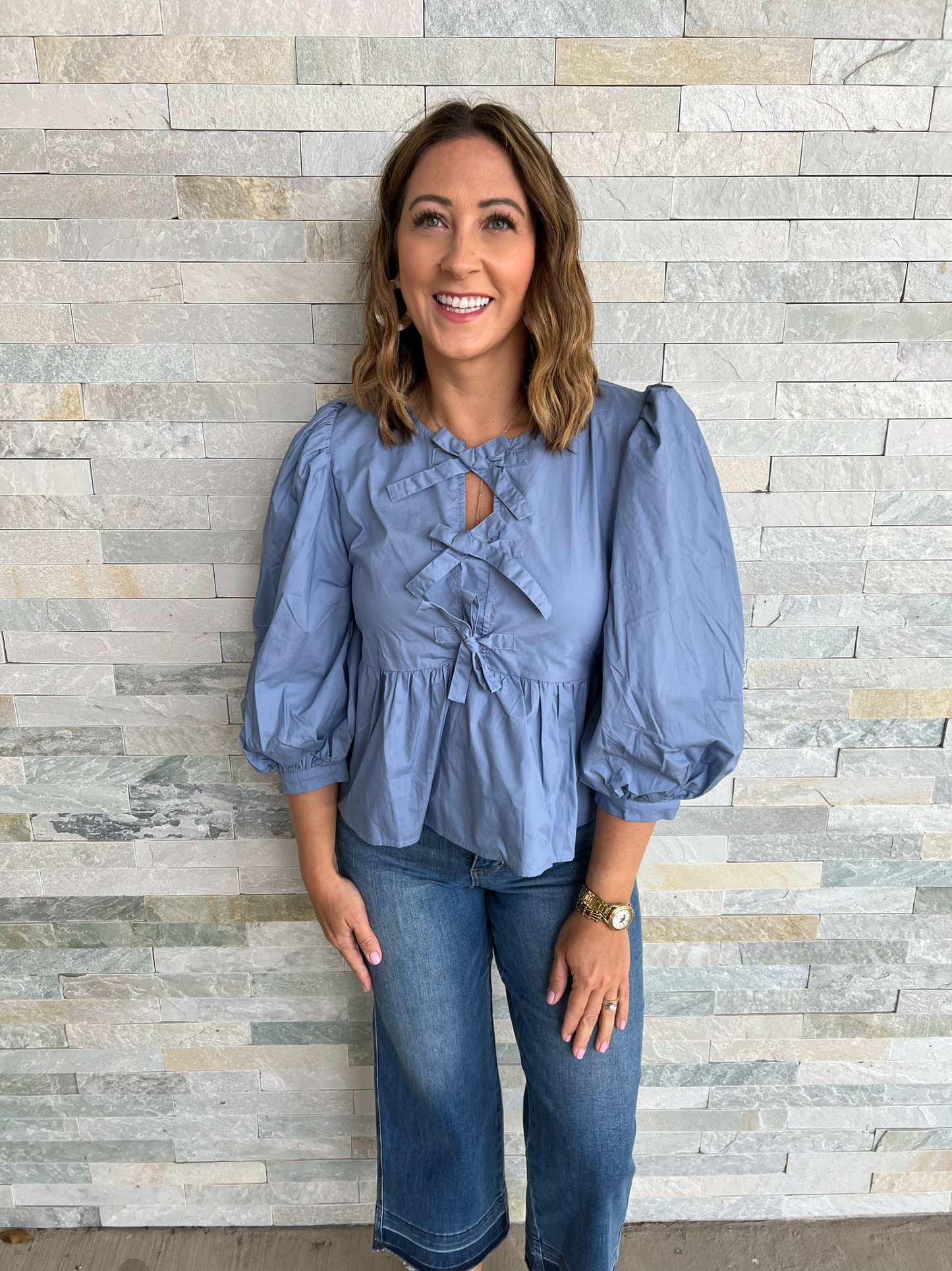 . Romance Denim Colored Bubble Sleeve Peplum Top with Bows