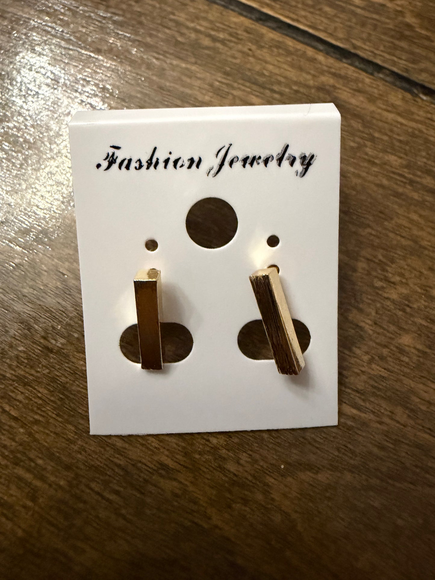 . Gold Stud Earrings