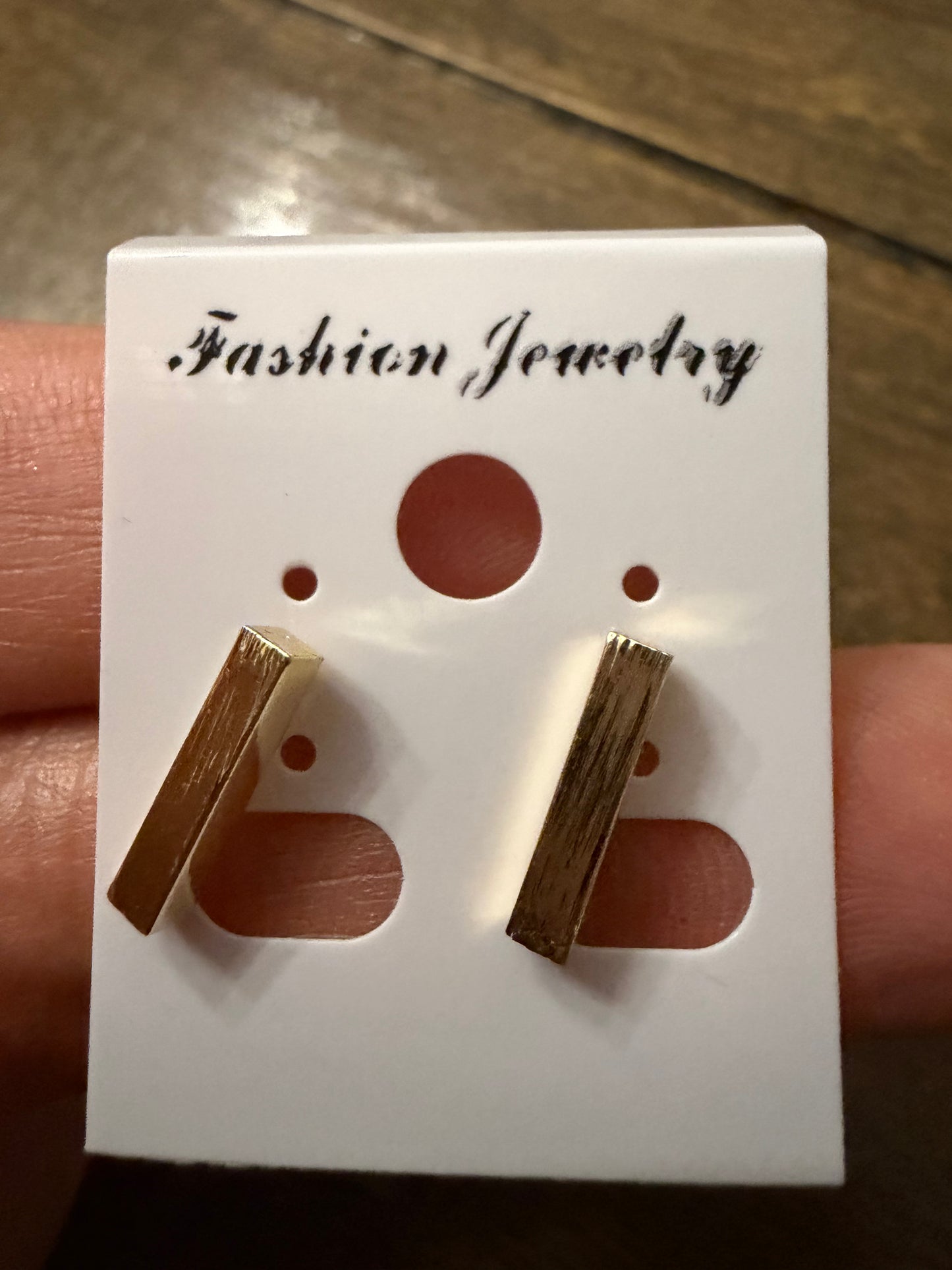 . Gold Stud Earrings