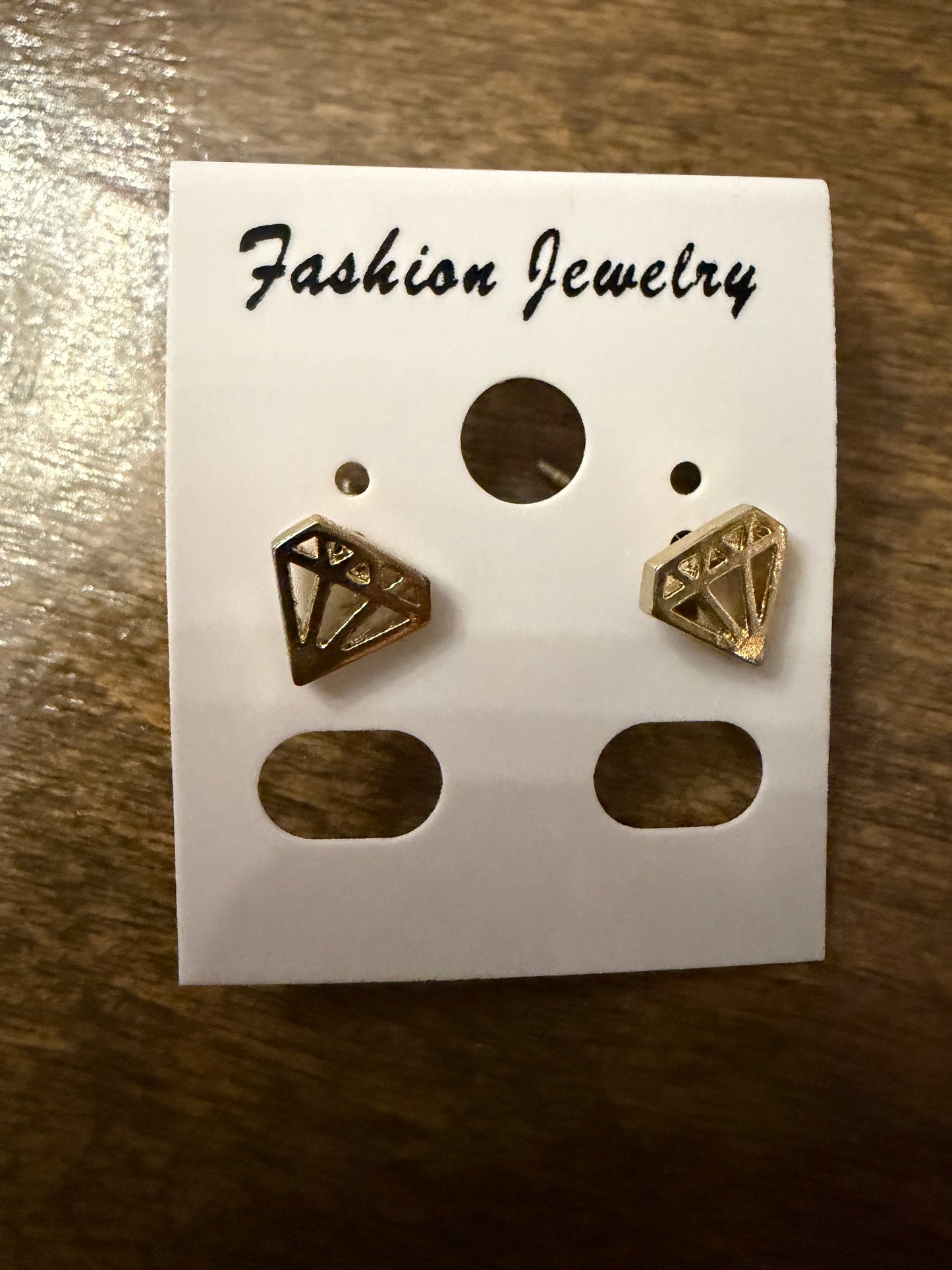 . Gold Stud Earrings